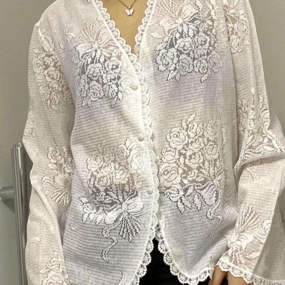 white lace top clean with floral detail and flared sleeves 90s 00s vibe